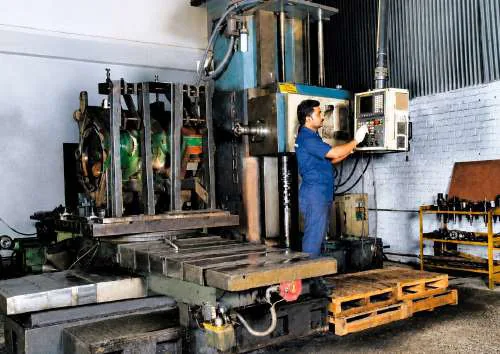 Operator at CNC boring machine